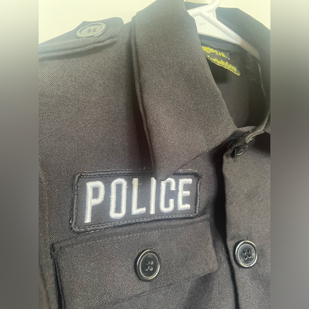 Kids police costume - large. Shirt only.